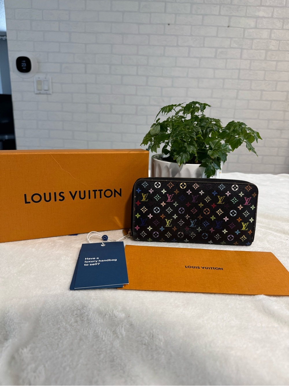 Louis Vuitton Murukami Zippy Wallet